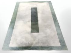 A machine made two-tone carpet,