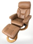 A Danish tan leather swivel armchair and matching footstool