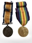 A WWI medal pair comprising British War Medal and Victory Medal, named to 170607 Pte T Brooks MGC.