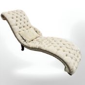 A contemporary chaise longue,
