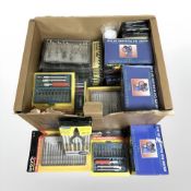 A group of tool sets including precision knives, screw drivers,