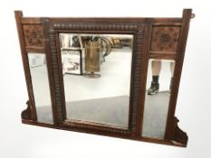 A carved oak overmantle mirror, 119 cm x 80 cm.