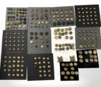 A good collection of over 270 Victorian and later British Army brass buttons, mounted on card,
