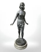 A continental Art Deco silvered metal figure of a semi-nude female, on polished marble socle,