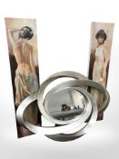 A contemporary silvered mirror,