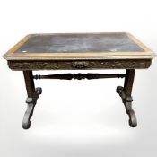 A Victorian carved oak library table,