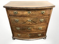 A 19th century continental burr walnut and ebonised bow front four drawer chest, on bun feet,