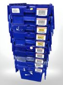 Ten stackable plastic storage boxes with folding lids,