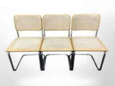 Three chrome framed cantilever chairs