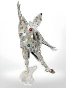 A Swarovski figure of a harlequin, height 20cm, in original box.