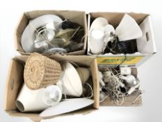 A quantity of continental light fittings, table lamps, shades, etc.