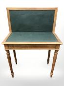 A 19th century walnut turnover top card table, width 80 cm.