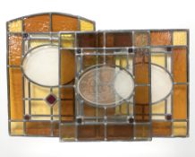 Three contemporary stained and leaded glass panels,