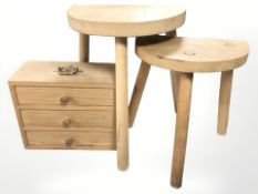 Two pine tripod stools and small three drawer chest, width 28 cm.