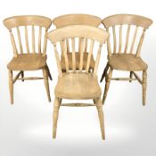 A set of four pine farmhouse style dining chairs