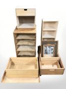 A group of Scandinavian plywood and pine shelves, trays,