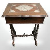 A 19th century mahogany worktable, the top inset with silver Art Nouveau relief panels, width 53 cm.