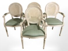 A set of four continental open armchairs with bergere backs.