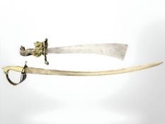 An Indian brass hilted sabre and a further reproduction Eastern sword.