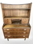 20th century Danish teak open bookcase fitted with drawers beneath,