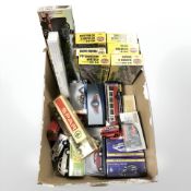 A group of Airfix railway modelling sets, boxed and unboxed diecast cars, buses and delivery wagons,