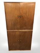 A pair of Danish teak double door cabinets, each 76 cm x 43 cm x 76 cm.