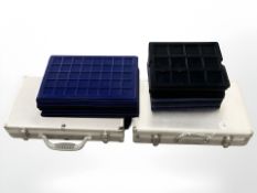 Two metal coin collector's cases and a large quantity of coin trays.
