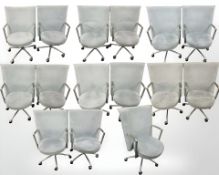 A set of fifteen Danish Erik Jorgensen designed 'Partner' chrome-framed executive swivel armchairs,