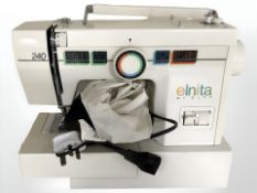 A Toyota electric sewing machine and an Elnita electic sewing machine, both with leads and pedals.