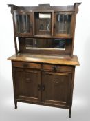 An Arts & Crafts oak dresser,