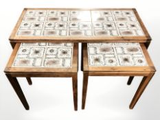 A nest of three Danish tile-inset tables,