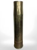 A large brass ammunition shell, height 62 cm.