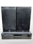 An NAD compact disc receiver L40 (continental plug) and a pair of Dali model 202 speakers.