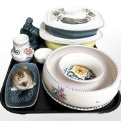 A collection of Poole pottery to include vase, fruit bowl, pair of figures of sea lions,