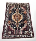A Hamadan rug, North-West Iran, 162 cm x 110 cm.