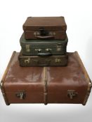 Four various vintage luggage cases, largest 74 cm wide.