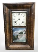 A 19th century continental mahogany wall clock, height 47 cm.