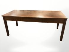 A Danish teak three drawer library table,