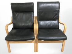 A pair of contemporary Danish bentwood armchairs with black leather cushions,
