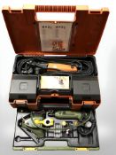 A Fein profile sander and a Proxxon dremel, both in fitted cases.