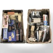 A collection of model railway buildings, track, scenery,