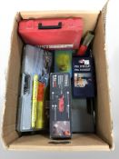 A group of tools and hardware, plug set, boxed multitool, drill bits, etc.