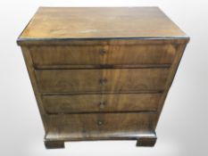 A 19th century walnut ebonised four drawer chest,