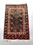 An Afghan/Caucasian rug 127 cm x 81 cm