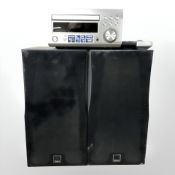 A Denon CD receiver RCD-M41DAB, with two remotes, together with a pair of Dali Compact 2 speakers.