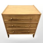 A 20th century pine and MDF five drawer chest,