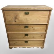 A late 19th century pine four drawer secretaire chest,