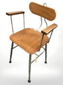 A 20th century Danish aluminium and laminated teak armchair in the manner of Niels Larsen