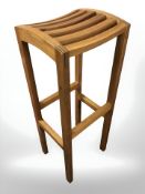 A contemporary Danish teak plant stand, height 85 cm.