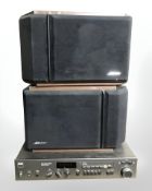 An NAD stereo receiver 7220PE (continental plug) together with a pair of Bose speakers.